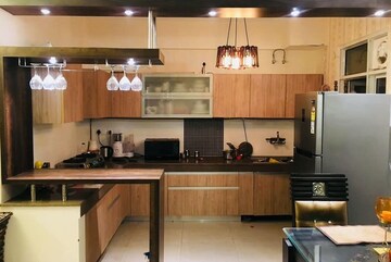 Kitchen in 3 BHK Apartment at Exotica Dreamville, Sector 16c Greater Noida – for Rent