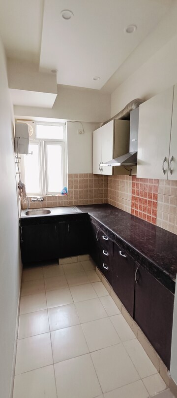 Kitchen in 2 BHK Apartment at Shree Vardhman Mantra, Sector 67 – for Rent