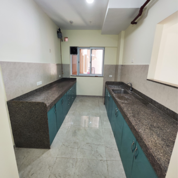 Kitchen in 2 BHK Apartment at Kumar Palmspring Towers, Undri – for Rent