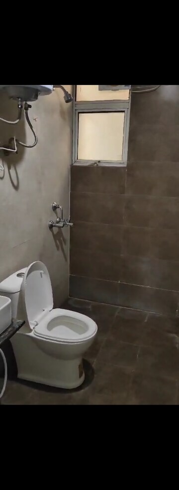 Bathroom in 3 BHK Apartment at M R Platinum 321, Raj Nagar Extension – for Rent