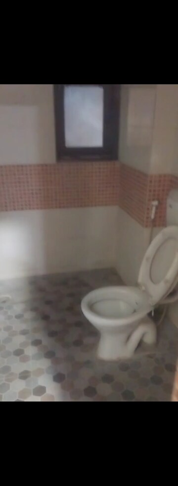 Bathroom in 3 BHK Apartment at Emenox Brave Hearts, Raj Nagar Extension – for Rent