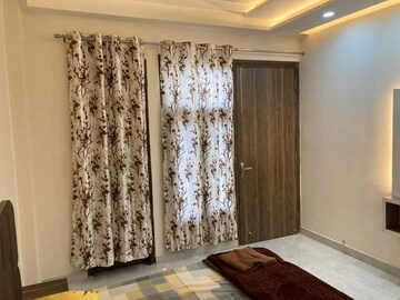 Bedroom in 3 BHK Builder Floor at Ansal Sushant Lok I, Sector 43 – for Rent