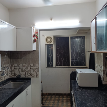 Kitchen in 2 BHK Apartment at Siddhivinayak Sunshree Kangan, Nibm – for Rent