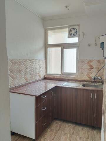 Kitchen in 2 BHK Apartment at Amrapali Leisure Park, Amrapali Leisure Valley – for Rent