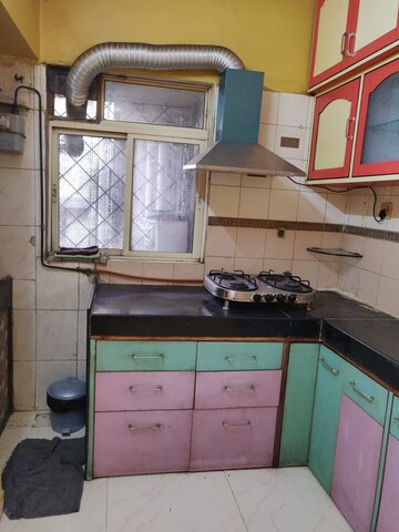 Kitchen in 2 BHK Apartment at RNA Courtyard, Mira Road – for Sale