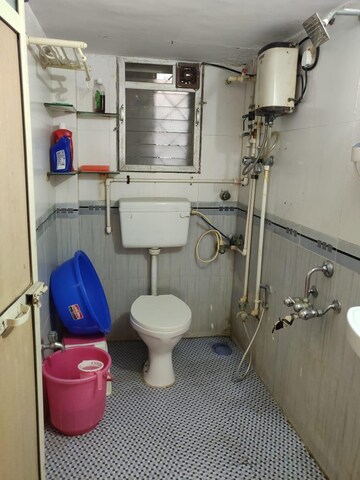 Bathroom in 2 BHK Apartment at RNA Courtyard, Mira Road – for Sale