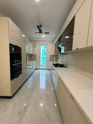 Kitchen in 4 BHK Builder Floor at Ansal API Esencia, Sector 67 – for Sale