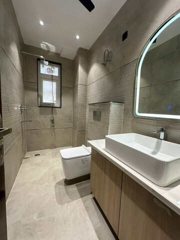Bathroom in 4 BHK Builder Floor at Ansal API Esencia, Sector 67 – for Sale