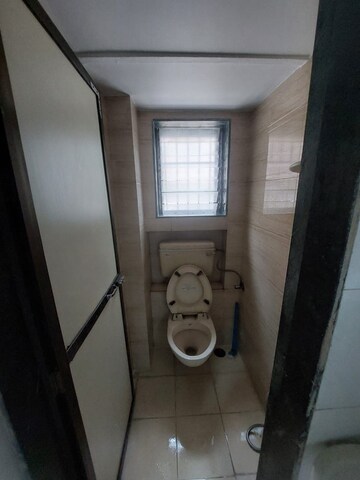 Bathroom in 2 BHK Apartment at Shree Krupa Keshav Heights Phase I, Parsik Nagar – for Rent