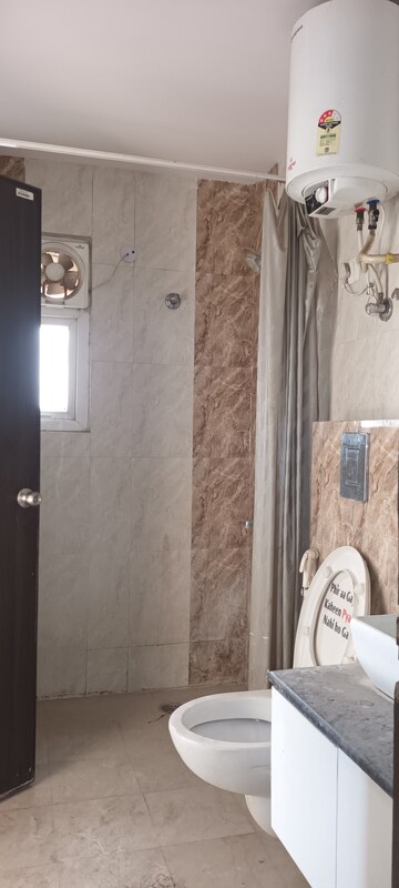 Bathroom in 3 BHK Apartment at Ramprastha Coral Heights, Ramprastha Greens – for Sale