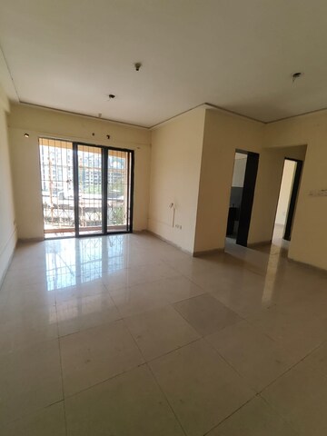 Room in 2 BHK Apartment at Mohan Pride, Kalyan West – for Sale