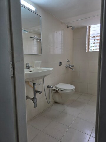 Bathroom in 2 BHK Apartment at Cozy Home, Bandra West – for Rent