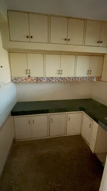 Kitchen in 2 BHK Apartment at Dhawal Giri Apartment, Sector 34 – for Sale