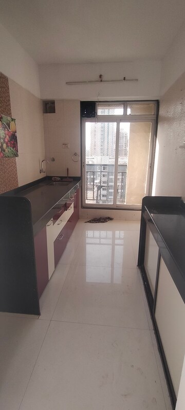 Kitchen in 2 BHK Apartment at Shree Sankalp, Ghodbunder Road – for Rent