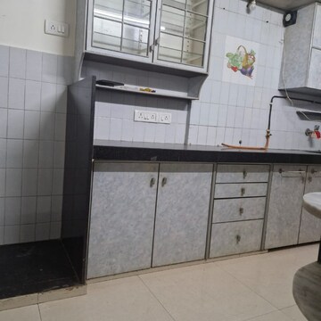 Kitchen in 2 BHK Apartment at Mota Mahal Apartment, Lokhandwala Complex Andheri – for Rent