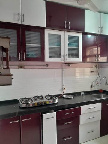Kitchen in 2 BHK Apartment at Lok Upvan I, Manpada – for Sale