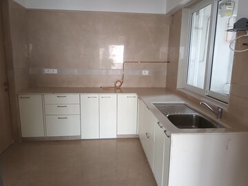 Kitchen in 3 BHK Apartment at Soham Crystal Spires, Ghodbunder Road – for Rent