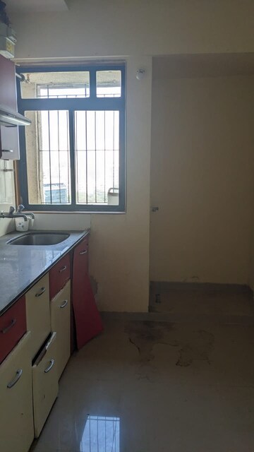 Kitchen in 1 BHK Apartment at Puranik Hometown, Ghodbunder Road – for Sale