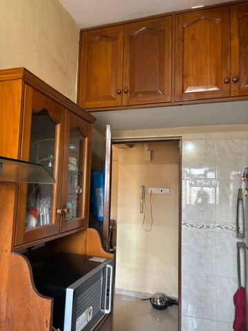 Kitchen in 1 BHK Apartment at K Raheja Heights, Malad East – for Rent