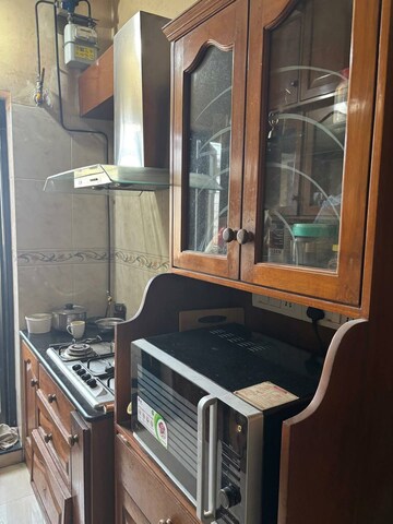 Kitchen in 1 BHK Apartment at K Raheja Heights, Malad East – for Rent