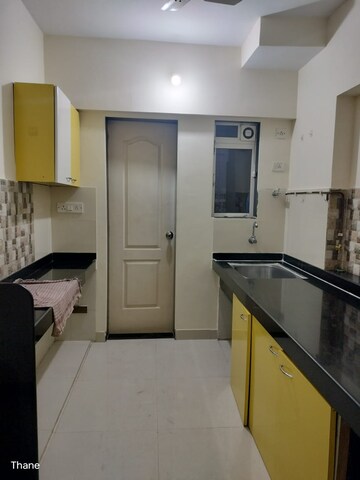 Kitchen in 1 BHK Apartment at Cosmos Enclave, Kasarvadavali – for Sale