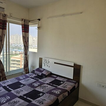 Bedroom in 2 BHK Apartment at Courtyard by Narang Realty and The Wadhwa Group, Pokhran Road No Two – for Rent