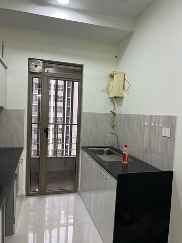 Kitchen in 2 BHK Apartment at Kalpataru Paramount, Kapur Bawdi – for Rent