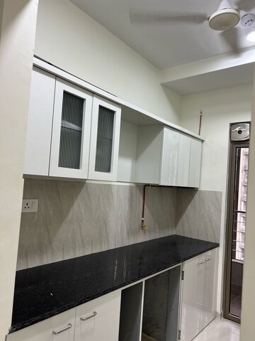 Kitchen in 2 BHK Apartment at Kalpataru Paramount, Kapur Bawdi – for Rent