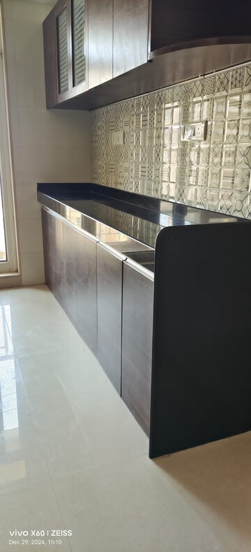 Kitchen in 2 BHK Apartment at Dosti Group Imperia, Manpada – for Rent