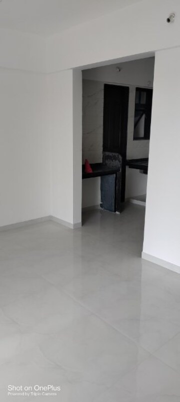 Living Room in 2 BHK Apartment at Shree Shankeshwar Crystal, Dudulgaon – for Rent