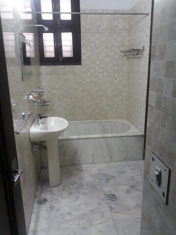 Bathroom in 2 BHK Apartment at Defence Colony – for Rent