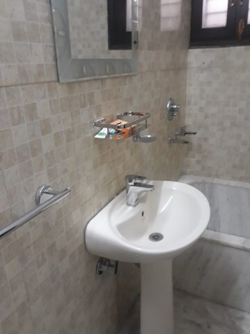 Bathroom in 2 BHK Apartment at Defence Colony – for Rent