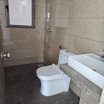 Bathroom in 2 BHK Apartment at Kalpataru Immensa B, Kolshet Industrial Area – for Rent