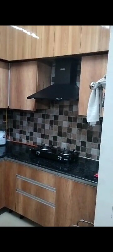 Kitchen in 2.5 BHK Apartment at Prateek Grand Carnesia, Siddharth Vihar – for Rent