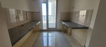Kitchen in 2 BHK Apartment at Piramal Vaikunth, Balkum Pada – for Rent