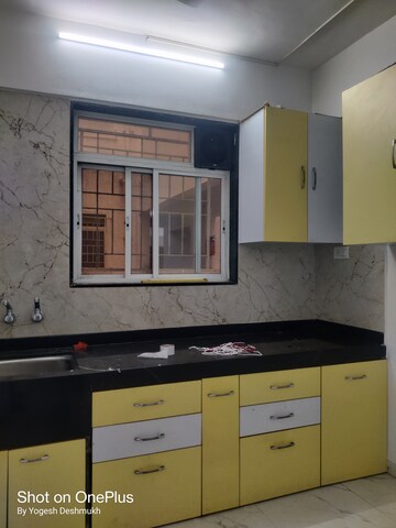 Kitchen in 2 BHK Apartment at Om Audumber, Shivane – for Sale