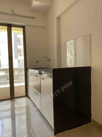 Kitchen in 2 BHK Apartment at Rustomjee Global City – for Sale