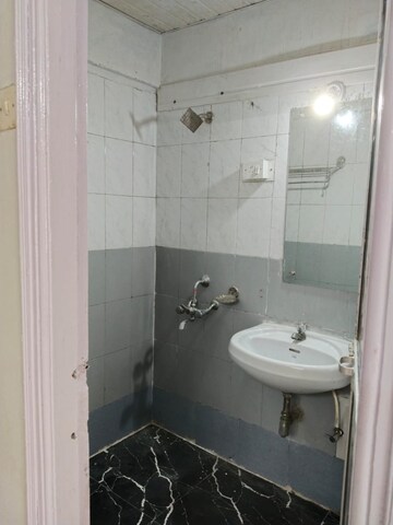 Bathroom in 2 BHK Apartment at Nahar Regency Park CHS, Chandivali – for Rent