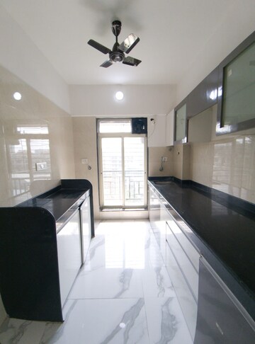 Kitchen in 1 BHK Apartment at N G Tivoli RNA, Mira Road – for Sale