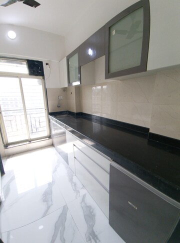 Kitchen in 1 BHK Apartment at N G Tivoli RNA, Mira Road – for Sale