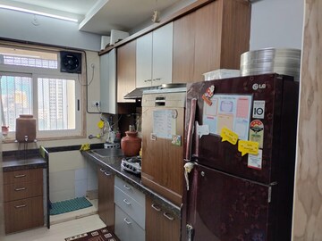 Kitchen in 2.5 BHK Apartment at Pride Presidency Luxuria, Ghodbunder Road – for Sale