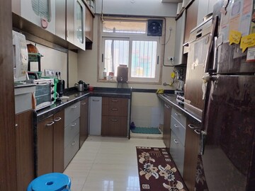 Kitchen in 2.5 BHK Apartment at Pride Presidency Luxuria, Ghodbunder Road – for Sale