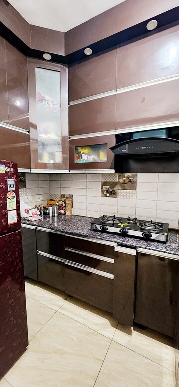 Kitchen in 2 BHK Apartment at Geotech Pristine Avenue, Sector 16c Greater Noida – for Rent