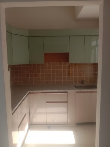 Kitchen in 2 BHK Apartment at Mahagun Mywoods, Sector 16c Greater Noida – for Rent