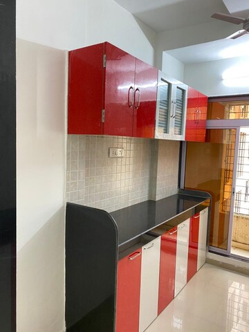 Kitchen in 2 BHK Apartment at Rustomjee Global City – for Sale