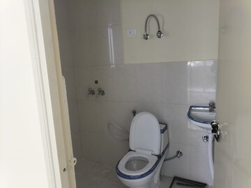 Bathroom in 2 BHK Apartment at Signature Global Orchard Avenue, Sector 93 – for Sale