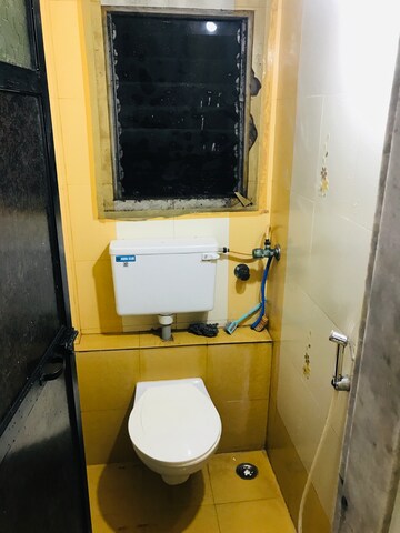 Bathroom in 1 BHK Apartment at Om Sadguru Nagar, Kandarpada – for Sale