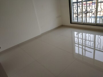 Room in 2 BHK Apartment at Unique Poonam Estate Cluster 2, Mira Road – for Sale