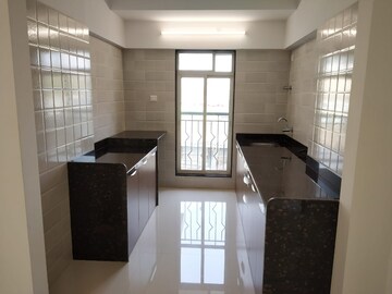 Kitchen in 2 BHK Apartment at Unique Poonam Estate Cluster 2, Mira Road – for Sale