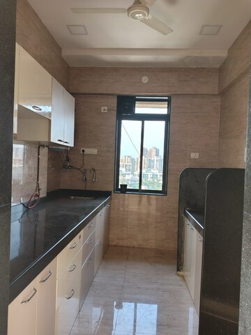 Kitchen in 3 BHK Apartment at Nandini Apartments Andheri West, Andheri West – for Rent